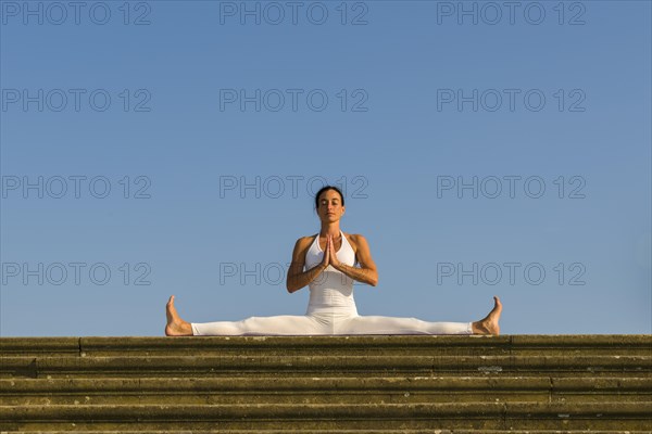 Young woman practising Hatha yoga