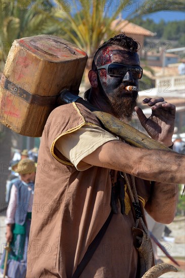 Participant of the El Firo Festival dressed as a pirate
