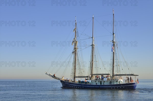 Sailing ship with passengers on the Baltic Sea