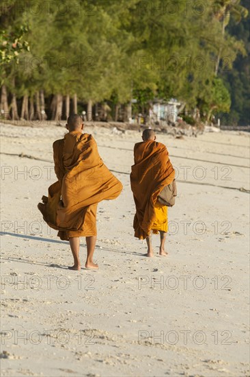 Monks collecting alms