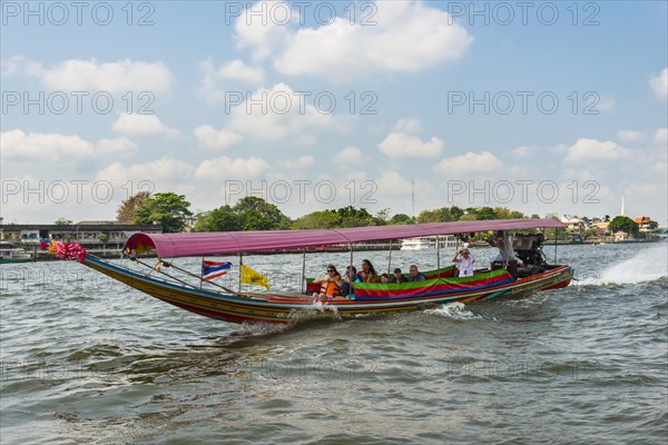 Colorful longtail boat on the Chao Phraya River