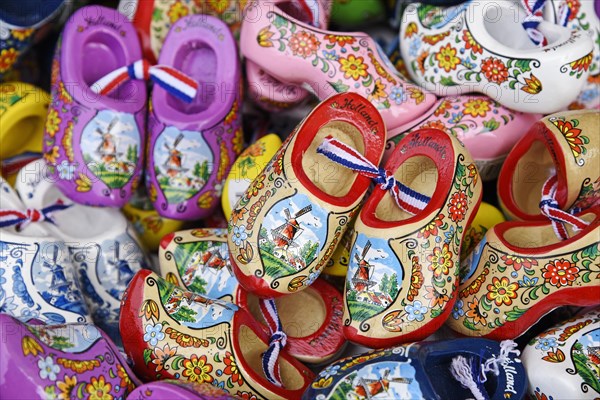 Colourful wooden Dutch shoes with windmill motif