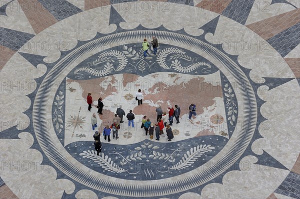 Compass rose with world map in the pavement in front of the Padrao dos Descobrimentos