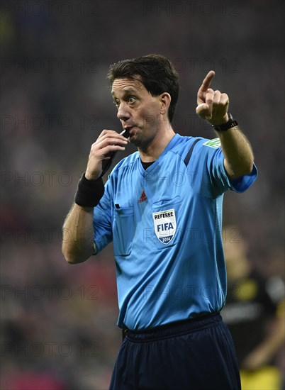 Referee Manuel Grafe whistles for a free kick