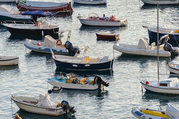 Fishing boats and inflatables in the sea