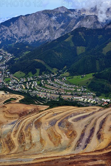 Open pit ore mining and workers' settlements