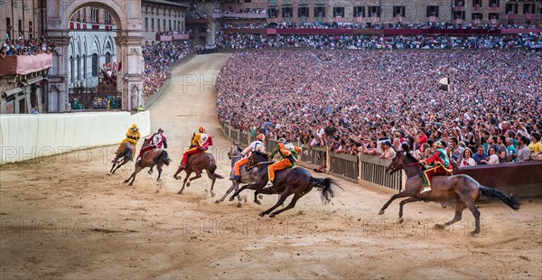 The Palio di Siena horse race on Piazza del Campo