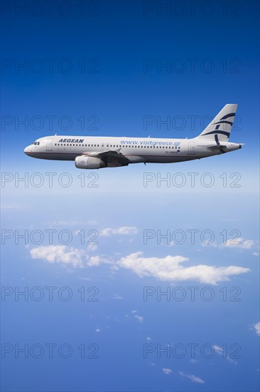 SX-DGD Aegean Airlines Airbus A320-232 in flight over the Mediterranean Sea