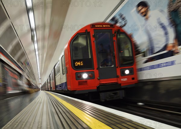 London Underground train pulling into a station