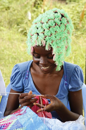 Woman crocheting