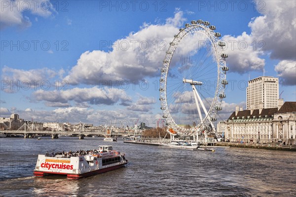 City Cruises riverboat approaching the London Eye