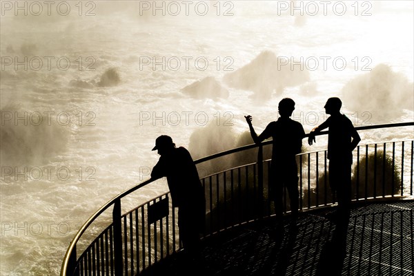 Tourists on the lookout platform at the Iguazu Falls