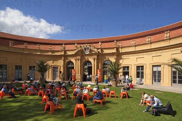 Audience at the annual Poetry Festival in the Castle Garden in front of the Orangery