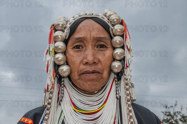 Traditionally dressed woman from the Akha people