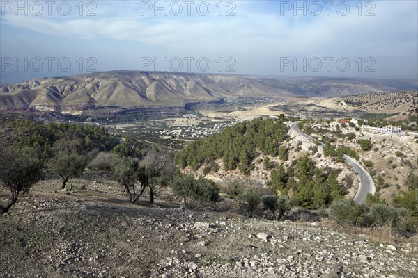 View across the fertile Jordan Valley with the the Golan Heights at the back
