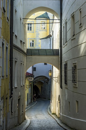 Narrow alleyway with flying buttresses