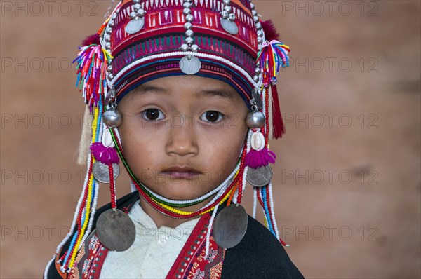 Traditionally dressed girl from the Akha people