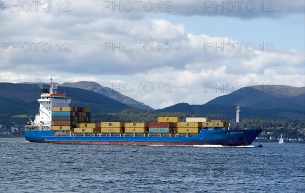 Container ship Hanse Courage in the Firth of Clyde off Dunoon