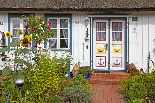 Typical house entrance with bench