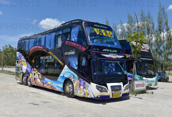 Double-deck coach in a car park