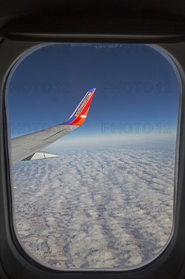 A Southwest Airlines plane flies above Nebraska