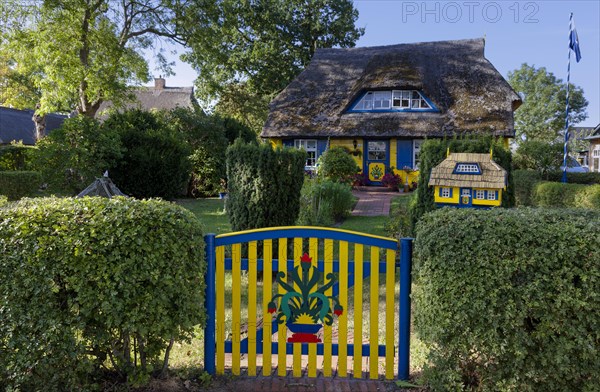 Typical old thatched cottage