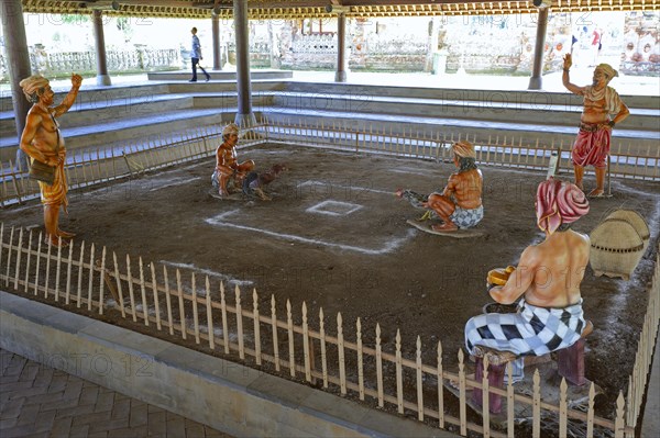 Representation of the traditional cock fight in the Pura Taman Ayun temple