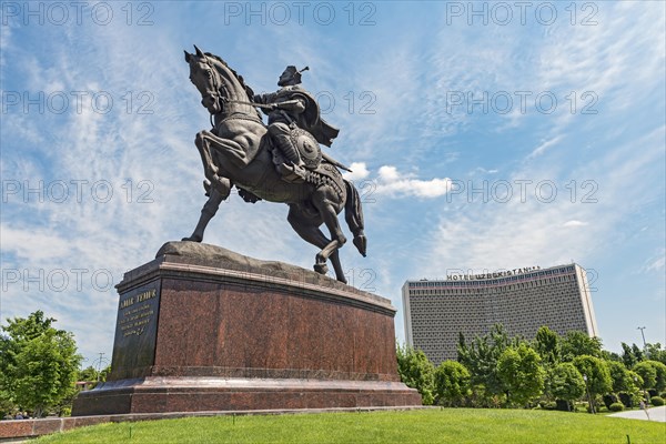 Amir Temur Statue and Hotel Uzbekistan building