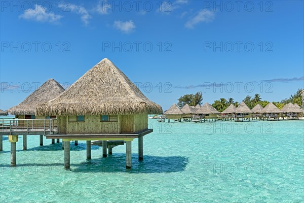 Overwater bungalows in the lagoon