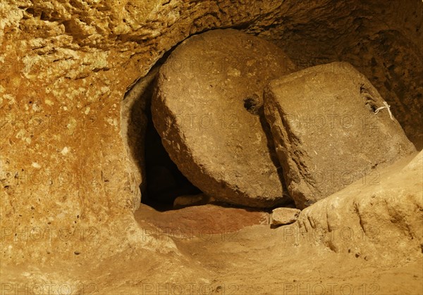 Door with a rolling stone