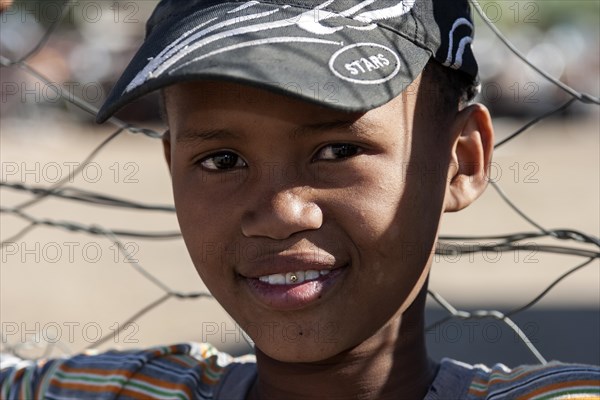 Local boy with baseball cap