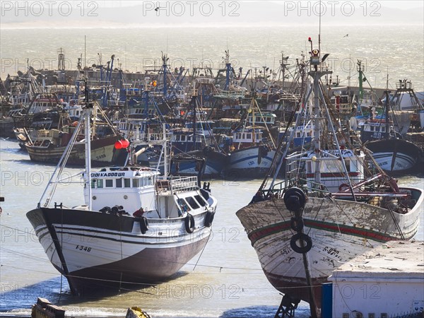 Old fishing boats in the port of Essaouira