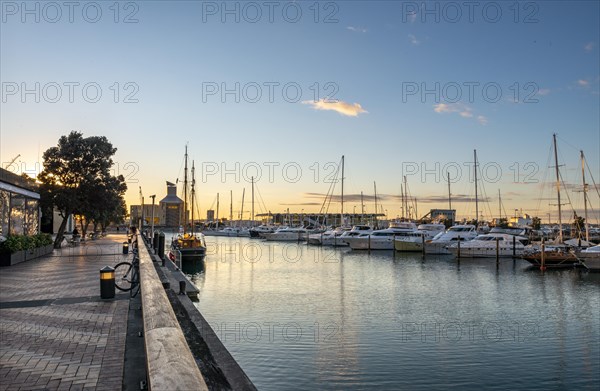 Promenade at the harbour at sunset