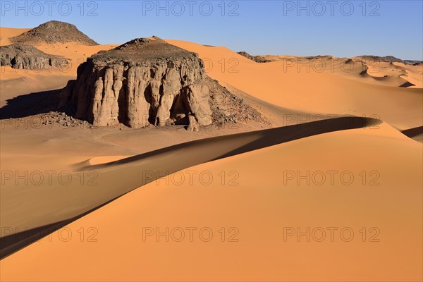 The sand dunes and rocks of Moul Naga