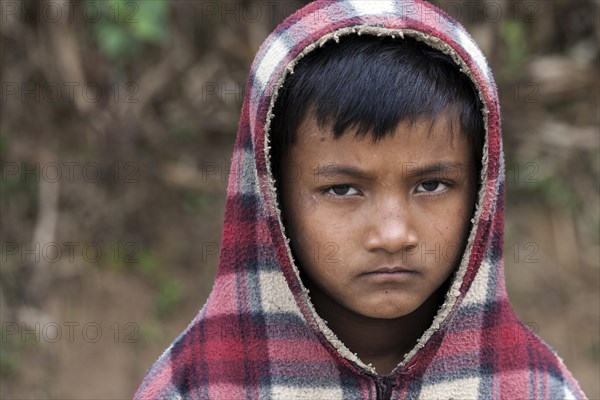 Nepalese boy with hood