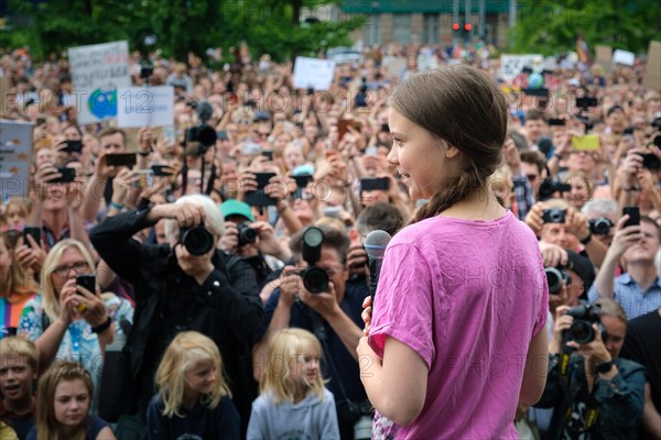 16-year-old Swedish climate activist Greta Thunberg addresses several thousand demonstrators at a Fridays for Future rally