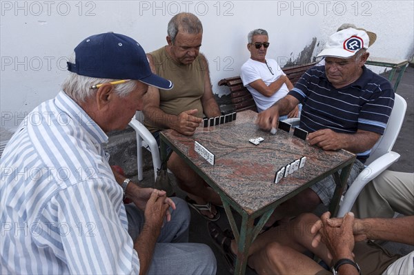 Men playing dominoes