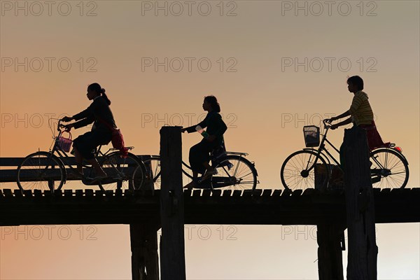 Silhouettes of cyclists