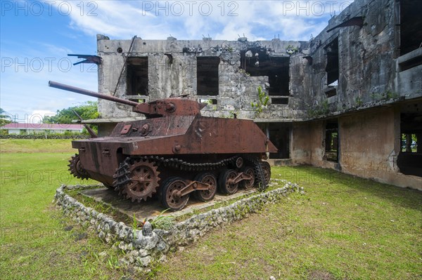 Old Japanese tank in front of the Japanese administration building