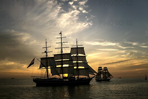 Evening sail with the tall ship Stad Amsterdam at the front