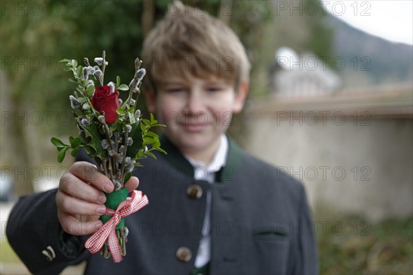 Boy with palm branches