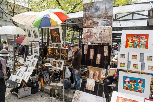 Painter sells pictures at Place du Tertre