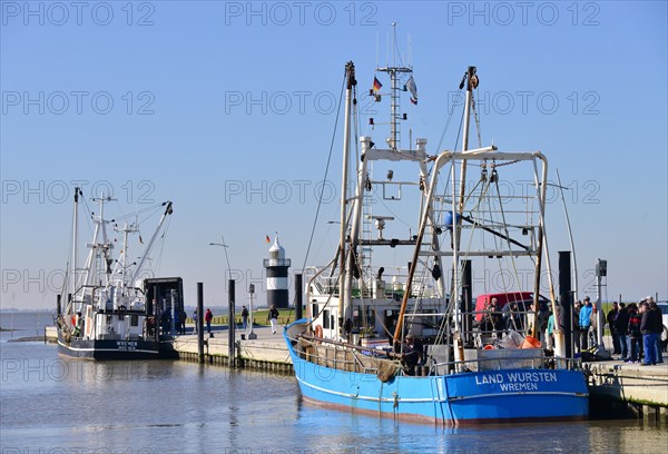 Cutters in the harbour with Kleiner Preusse or Little Prussian Lighthouse