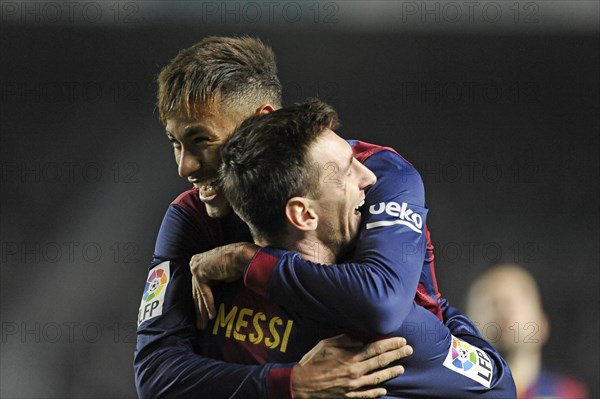 Neymar and Lionel Messi cheering
