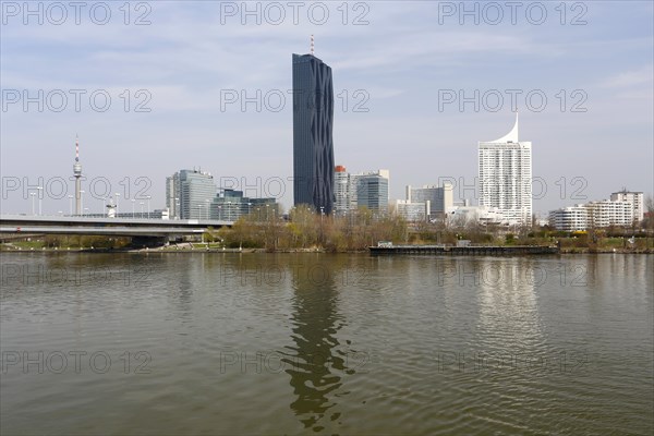 Donauturm or Danube Tower and Kaisermuhlen district with UNO City