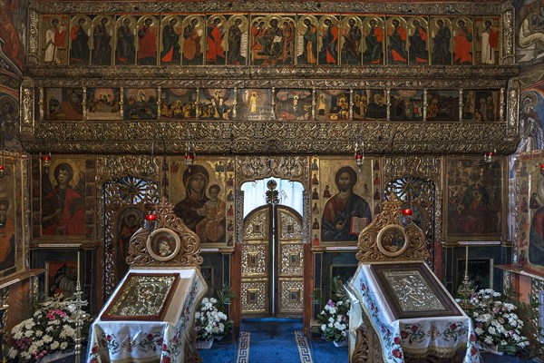 Prayer tables in front of the altar wall in the Humor monastery