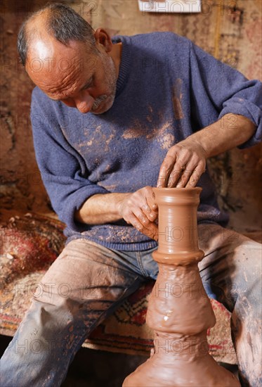 Potter Hasan Bircan in his pottery Chez Bircan