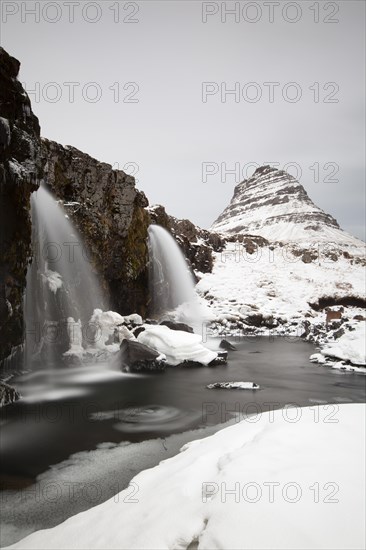 Kirkjufell mountain with waterfall