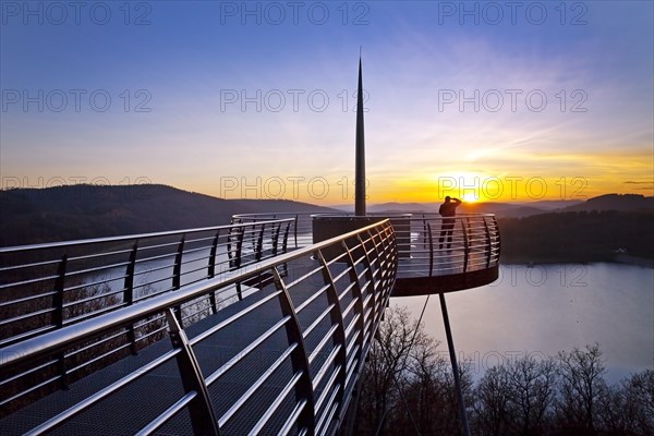 Viewing platform Biggeblick with a person at sunset