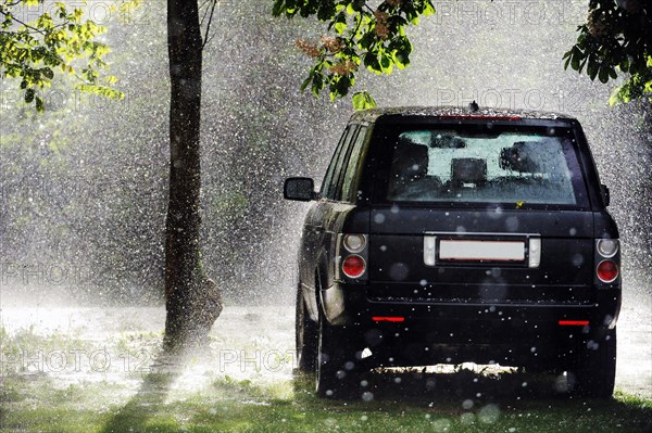 Parked SUV in the rain